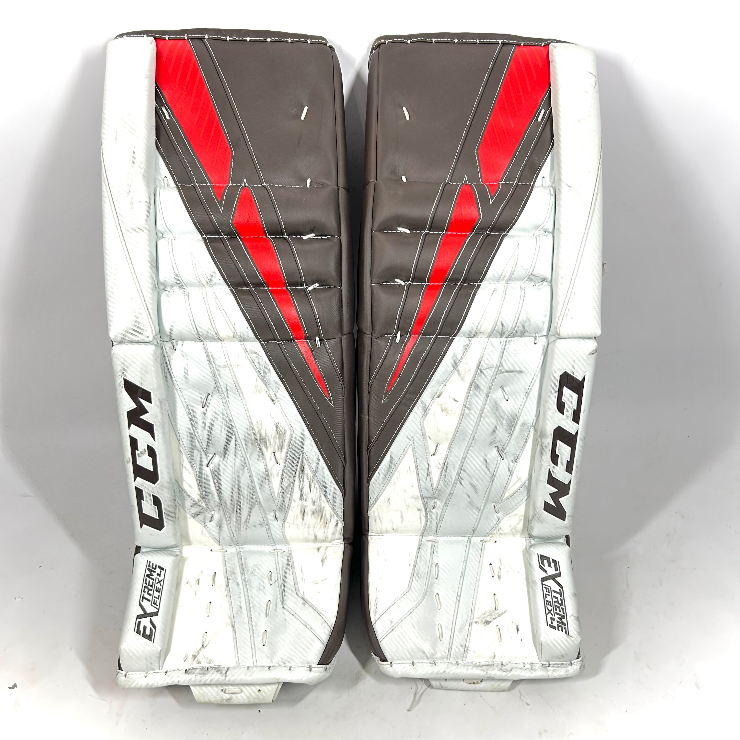 CCM Extreme Flex 4 - Jambières de gardien de but senior Pro Stock d'occasion (marron/rouge)